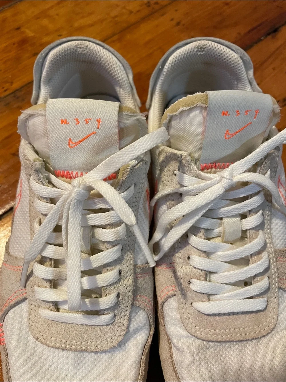 Nike Women's Sneakers in White with Beige and Coral Accents